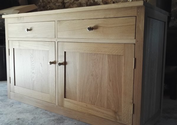 Large oak sideboard with two dovetail drawers and two doors