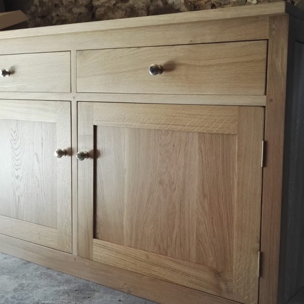 Large oak sideboard with two dovetail drawers and two doors