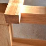 detail of oak dining table made with oak beams