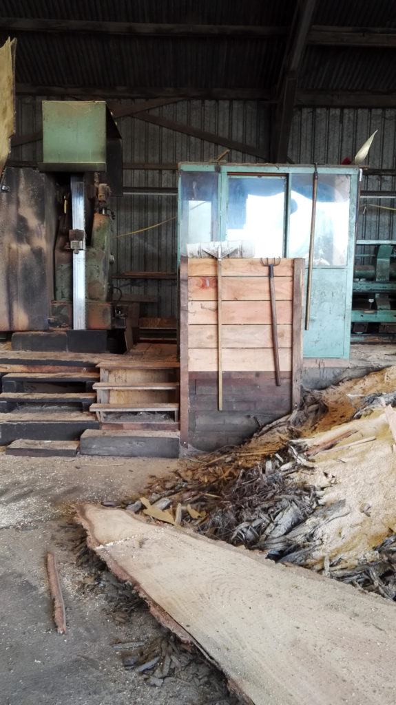 Old French woodworking machines with sawdust and tools