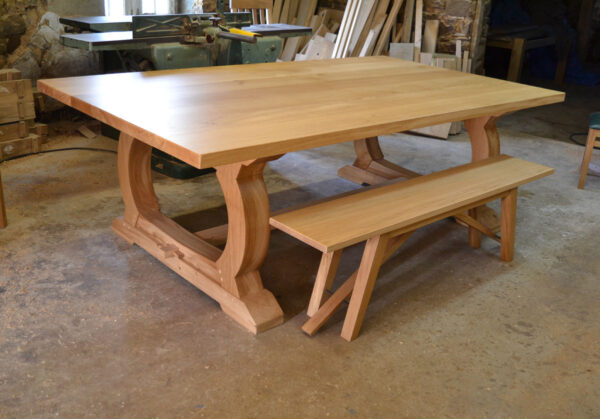 Handmade oak dining table with curved legs