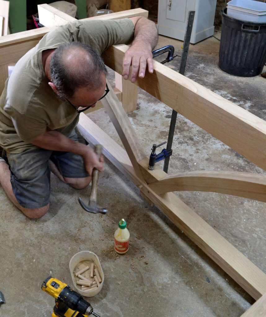 Contemporary oak refectory table base in progress in the Makers workshop