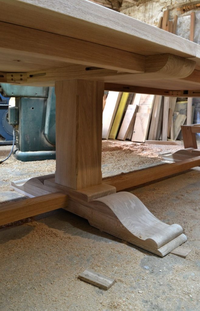 Large table with pedestal legs