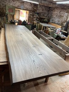 Live edge oak table with an oil finish