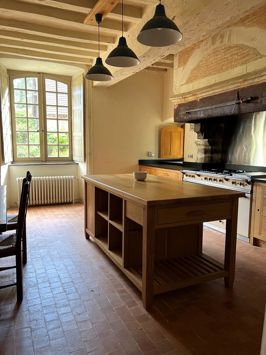 Bespoke oak kitchen island in a french kitchen